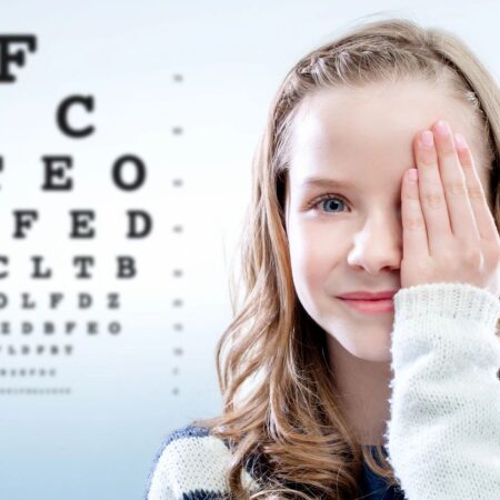 Child doing an eye exam